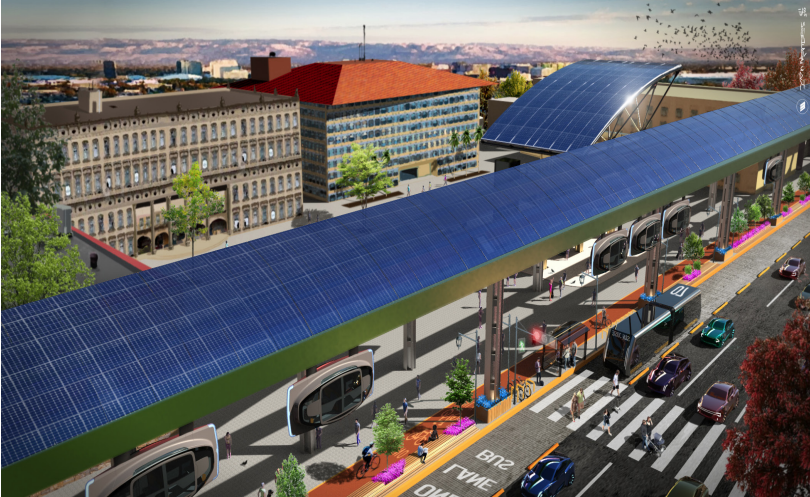 计算机生成的太阳能公共交通系统的彩色图像，悬挂在普通道路的中心.